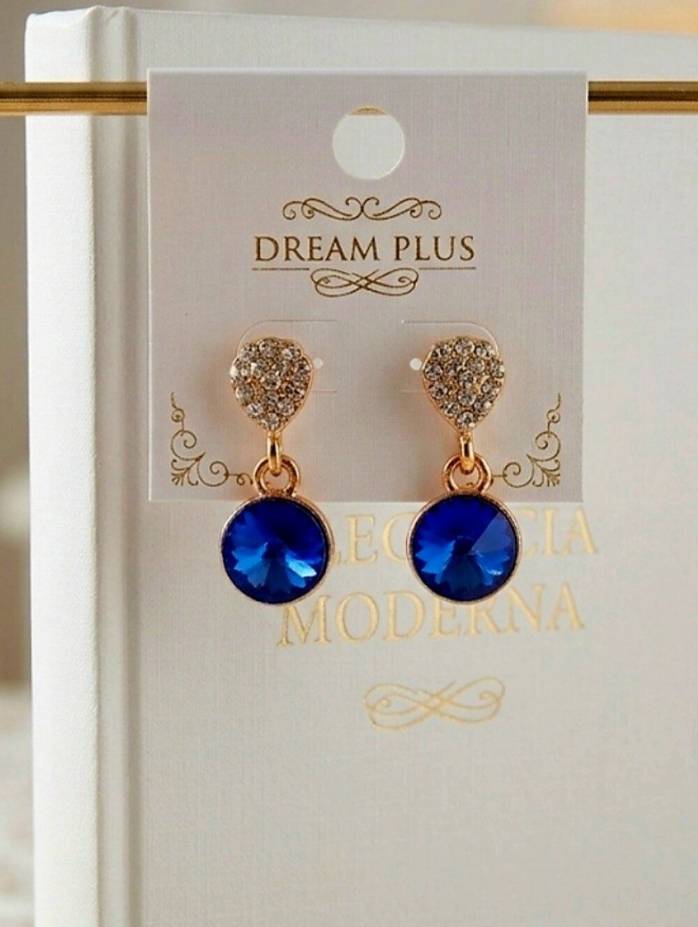 Gold-tone synthetic crystal earrings, adorned with high-quality blue and white